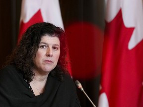 Auditor General Karen Hogan holds a press conference in Ottawa, Dec. 6, 2022. The Auditor General says two thirds of people with disabilities encountered barriers on federally regulated planes and trains in 2019 and 2020, and is highlighting a lack of consultation and enforcement by agencies involved.