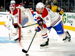 Canadiens defenceman Mike Matheson (8) skates with the puck against Vegas Golden Knights' Keegan Kolesar (55) on Sunday, March 5, 2023, in Las Vegas.