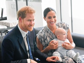 Duke and Duchess of Sussex with their son Archie are pictured in South Africa on Sept. 25, 2019.