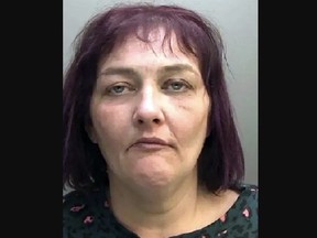 Mugshot of woman who killed and ate pet hamster.