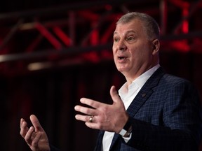 CFL commissioner Randy Ambrosie delivers his state of the league media address at the Hamilton Convention Centre during the CFL's Grey Cup week in Hamilton, Ontario on Friday, December 10, 2021.