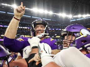 Dec 17, 2022; Minneapolis, Minnesota, USA; Minnesota Vikings place kicker Greg Joseph (1) celebrates his game winning field goal against the Indianapolis Colts after the game at U.S. Bank Stadium. With the win, the Minnesota Vikings clinched the NFC North.