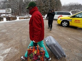 A refugee arrives at the Roxham Rd. border crossing at the U.S.-Canada border in Champlain, N.Y. The Roxham Rd. crossing closed at midnight March 24, as Canadian and U.S. media reported that Canada will be able to turn back illegal migrants at the crossing point on the frontier between New York state and Quebec. The reports said that Canada has agreed in return to take in some 15,000 asylum seekers from Latin America through legal channels, a move that will ease the pressure on the southern U.S. border.