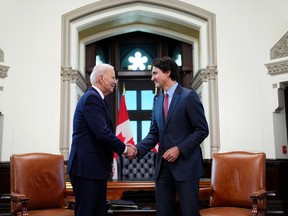 Prime Minister Justin Trudeau and U.S. President Joe Biden take part in a meeting on Parliament Hill, in Ottawa, Friday, March 24, 2023.