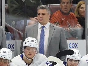 Sheldon Keefe behind the bench of the Toronto Maple Leafs agianst the Arizona Coyotes at Mullett Arena on December 29, 2022 in Tempe, Arizona.