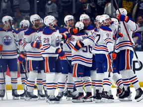 The Edmonton Oilers celebrate a 5-4 win against the Los Angeles Kings in Game Six of the First Round of the 2023 Stanley Cup Playoffs at Crypto.com Arena on April 29, 2023 in Los Angeles, California. The Oilers won the series against the Kings 4-2.