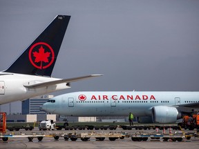 WELCOME TO TORONTO! Air Canada planes are parked at Toronto Pearson Airport in Mississauga, Ont., April 28, 2021.
