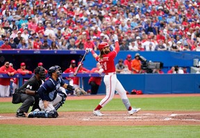 Bo Bichette #11 of the Toronto Blue Jays hits a two RBI double against the Tampa Bay Rays in the third inning during their MLB game at the Rogers Centre on July 1, 2022 in Toronto, Ontario, Canada. (Photo by Mark Blinch/Getty Images)