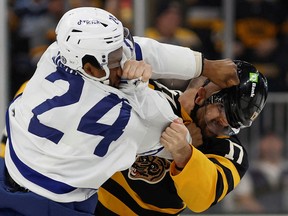 Maple Leafs' Wayne Simmonds fights with former teammate Nick Foligno of the Bruins during the first period at TD Garden.