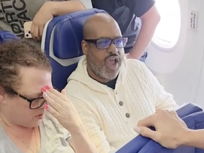 An airline passenger embarrassed his wife and behaved like an overgrown child in freaking out about a crying toddler on a flight recently.