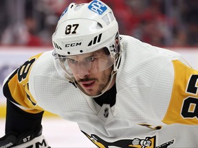Sidney Crosby of the Pittsburgh Penguins gets ready for a first period face off against the Detroit Red Wings at Little Caesars Arena on April 8, 2023 in Detroit, Michigan.
