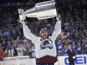 Avalanche captain Gabriel Landeskog lifts the Stanley Cup after the team defeated the Lightning in Game 6 of the Stanley Cup Finals on June 26, 2022, in Tampa, Fla.