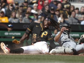 Apr 9, 2023; Pittsburgh, Pennsylvania, USA; Chicago White Sox catcher Seby Zavala tags Pittsburgh Pirates shortstop Oneil Cruz out at home plate attempting to score during the sixth inning at PNC Park.