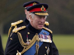 King Charles III arrives for the 200th Sovereign's Parade at the Royal Military Academy Sandhurst (RMAS) in Camberley, England, Friday, April 14, 2023.