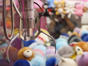 A 13-year-old boy had to be rescued after he climbed into a claw machine at a North Carolina amusement park over the weekend.