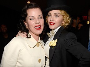 Debi Mazar and Madonna are pictured on June 18, 2013 at the premiere of Madonna's MDNA Tour at The Paris Theatre in New York City.