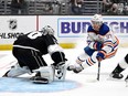 Apr 21, 2023; Los Angeles, California, USA; Los Angeles Kings goaltender Joonas Korpisalo (70) blocks a shot on goal by Edmonton Oilers center Connor McDavid (97) in the first quarter of game three of the first round of the 2023 Stanley Cup Playoffs at Crypto.com Arena. Mandatory Credit: Jayne Kamin-Oncea-USA TODAY Sports