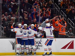 Apr 23, 2023; Los Angeles, California, USA; Edmonton Oilers celebrate the goal scored by left wing Evander Kane (91) against the Los Angeles Kings during the third period in game four of the first round of the 2023 Stanley Cup Playoffs at Crypto.com Arena.
