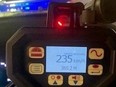 An image tweeted by OPP of a display reading 235 km/h after a driver was pulled over on Hwy. 401 on April 9, 2023.