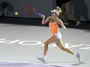 Canada's Eugenie Bouchard hits a forehand to Sara Sorribes Tormo, of Spain, during the women's final in the Abierto of Zapopan tennis tournament in Zapopan, Mexico, Saturday, March 13, 2021.