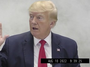 In this image from video provided by the New York State Attorney General, former President Donald Trump is sworn in for a deposition on Aug. 10, 2022, in New York.
