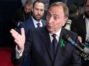 NHL commissioner Gary Bettman answers questions during a media scrum in Montreal on Tuesday Jan. 24, 2023.