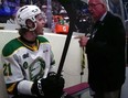 An off-ice Ontario Hockey League official argues with London Knights player Ryan Humphrey in the penalty box at the Peterborough Memorial Centre during Game 4 of the OHL finals on Wednesday May 17, 2023. (Screengrab/TSN)