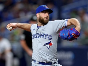 Anthony Bass of the Toronto Blue Jays pitches against the Tampa Bay Rays.