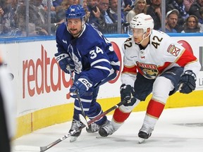 Gustav Forsling of the Florida Panthers skates against Auston Matthews of the Toronto Maple Leafs during Game Two of the Second Round of the 2023 Stanley Cup Playoffs at Scotiabank Arena on May 4, 2023 in Toronto, Ontario, Canada.