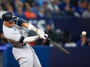 New York Yankees slugger Aaron Judge launches a home run in the eighth inning against the Toronto Blue Jays at Rogers Centre on Tuesday, May 16, 2023.