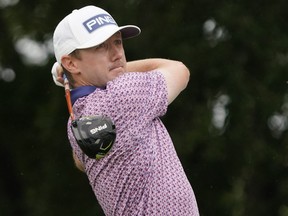 Mackenzie Hughes plays his shot from the second tee during the final round of the AT&T Byron Nelson.