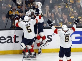 Florida Panthers' Carter Verhaeghe (23) celebrates after his goal in overtime during Game 7 of an NHL hockey Stanley Cup first-round playoff series against the Boston Bruins, Sunday, April 30, 2023, in Boston.