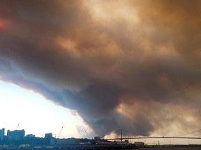 Smoke rises from a wildfire, in Halifax, N.S., May 28, 2023, in this still image obtained from social media video.