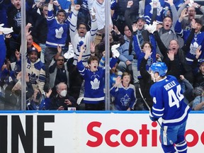 Toronto Maple Leafs fans react as Maple Leafs defenceman Morgan Rielly (44) celebrates his goal against the Tampa Bay Lightning during first period NHL Stanley Cup playoff hockey action in Toronto on Thursday, April 27, 2023.
