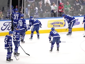 Maple Leafs players leave the ice after their 3-2 loss to the Florida Panthers in Game 2 of their second-round NHL playoff series in Toronto on Thursday, May 4, 2023.