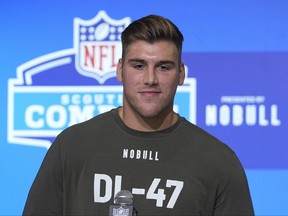 Iowa defensive lineman Lukas Van Ness speaks during a news conference at the NFL football scouting combine, Wednesday, March 1, 2023, in Indianapolis.