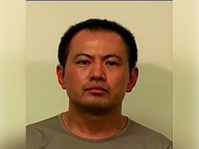 Cheng Huang, 47, is wanted Canada-wide on numerous fraud charges, as well as forgery, threats and firearms offences in Vancouver.
