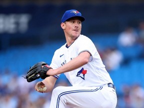 Blue Jays starter Chris Bassitt delivers a pitch in the first inning against the Braves at Rogers Centre in Toronto, Friday, May 12, 2023.