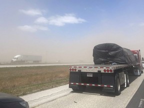 View of traffic during a dust storm along the I-55 highway in Springfield, Illinois, Monday, May 1, 2023 in this still image obtained from social media video.