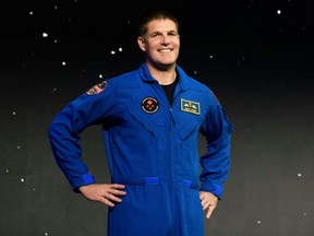 Canadian astronaut Jeremy Hansen smiles after being selected for the Artemis II mission during a news conference held by NASA and CSA at NASA Johnson Space Center's Ellington Field in Houston, April 3, 2023.