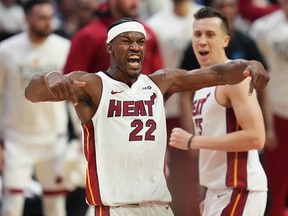 Miami Heat forward Jimmy Butler celebrates after making a shot against the Milwaukee Bucks in the fourth quarter during game four of the 2023 NBA Playoffs at Kaseya Center in Miami, Fla., on April 24, 2023.