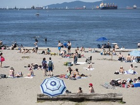 Sunshine and warm temperatures at Kits Beach in Vancouver, May 13, 2023.
