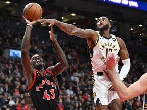 Toronto Raptors forward Pascal Siakam (43) shoots the ball as Indiana Pacers forward Oshae Brissett (12) defends in the second half at Scotiabank Arena.