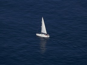 A sailboat is pictured sailing in the Mediterranean sea near the British overseas territory of Gibraltar, south of Spain August 16, 2013.