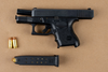 This handgun was one of the weapons seized in the jewel store busts. PEEL POLICE