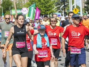 Rejeanne Fairhead (centre) and her team took part in the 5K at the Tamarack Ottawa Race Weekend on May 27, 2023.