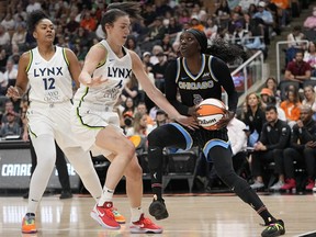 Minnesota Lynx forward Bridget Carleton (6) defends against Chicago Sky guard Kahleah Copper (2) during the first half at Scotiabank Arena