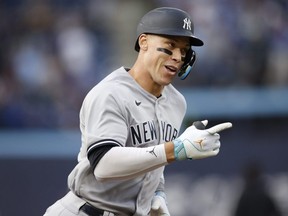 Aaron Judge of the New York Yankees runs out a home run in the first inning of their MLB game against the Toronto Blue Jays at Rogers Centre on May 15, 2023 in Toronto.