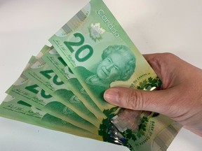 Canadian $20 bills are pictured in Toronto on September 9, 2022.