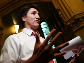 Prime Minister Justin Trudeau speaks to reporters before a meeting of the Liberal caucus in Ottawa, Wednesday, May 31, 2023.